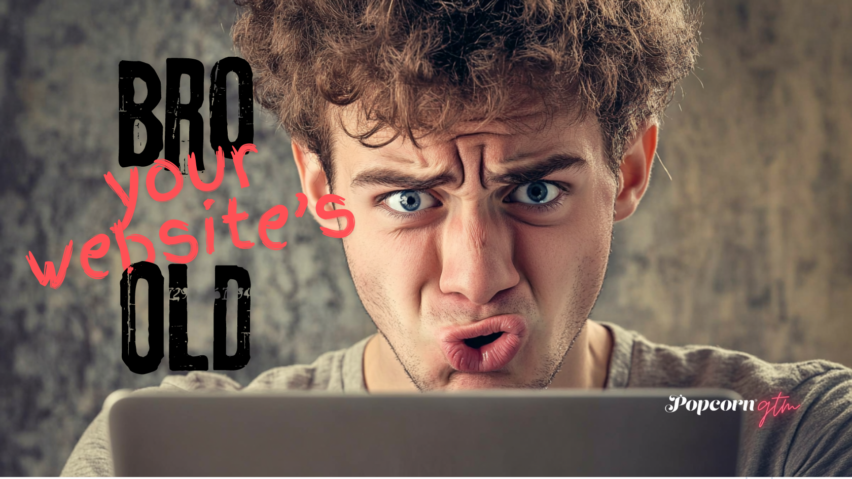  young man looking at website with disgust 